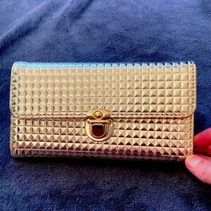 Golden quilted wallet